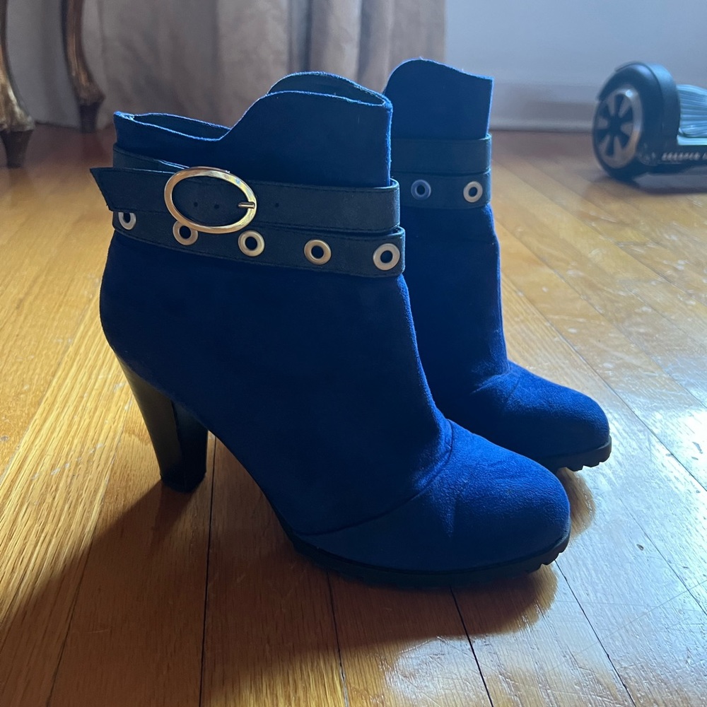 Blue buckled heeled booties